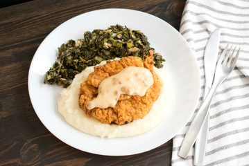 Chicken Fried Steak and Gravy with Mashed Potatoes and Collard Greens