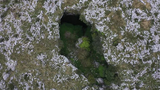Aerial view of a sima in Mortero de Astrana, Astrana, Alto Ason, Soba Valley, Cantabria, Spain, Europe