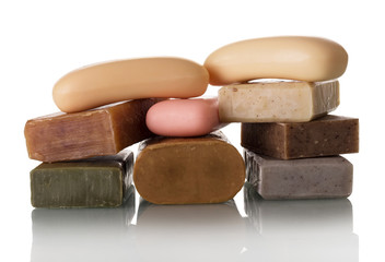 Variety of scents in handmade soap isolated on white