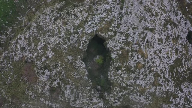 Aerial view of a sima in Mortero de Astrana, Astrana, Alto Ason, Soba Valley, Cantabria, Spain, Europe