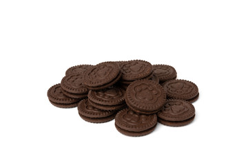Chocolate cookies with milk filling isolated on white background.