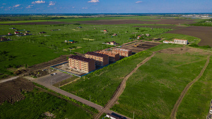 Obraz premium Summer aerial view of construction in cottage village