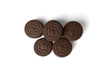 Chocolate cookies with milk filling isolated on white background.