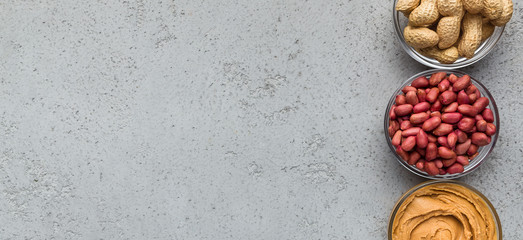 Bowls with peanuts and peanut butter