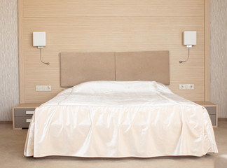 Fototapeta na wymiar Luxury bed in hotel room