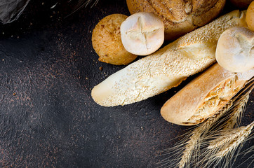 Assortment of baked goods in black background