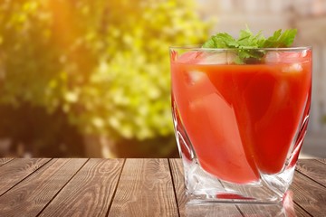 Glass of alcohol cocktail on white background, bloody Mary.