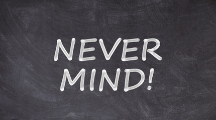 Obraz premium Never mind written on blackboard