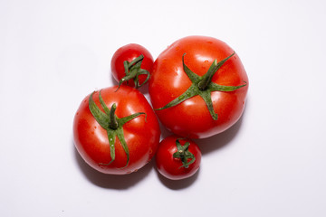 fresh tomatoes on white background