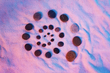 Stones on sand in a beach. Summer vacation. Sunset