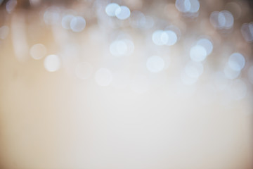 Stylish light background. Blurred glasses with bokeh