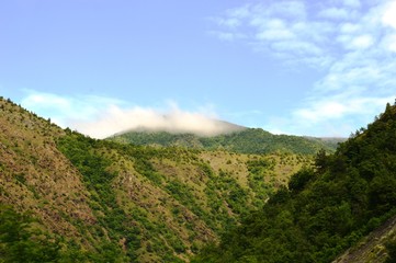 Obraz premium landscape of the hills in the clouds