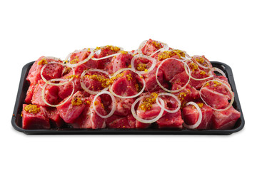 Obraz premium Tray with marinated meat cutted on pieces and ready for shashlik or kebab isolated on white
