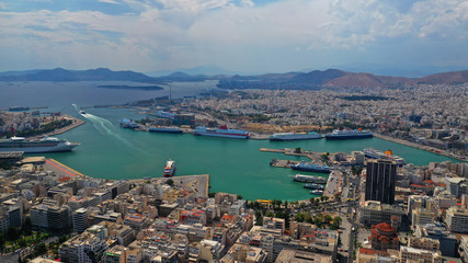 Fototapeta na wymiar Aerial panoramic view of famous port of Piraeus one of the largest and busiest in Mediterranean sea where passenger ships travel to Aegean destinations, Attica, Greece