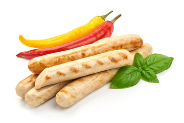 Grilled German White Thin sausages, close-up, isolated on white background