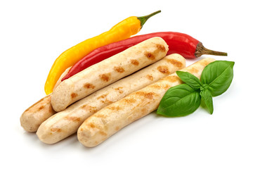 Grilled chicken sausages, close-up, isolated on white background