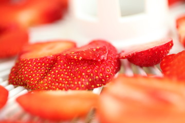 Strawberry berries cut dry plastic grid dryers