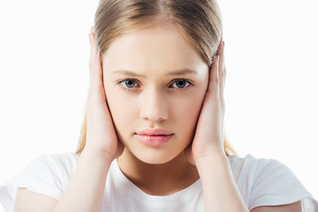 offended teenage girl covering ears with hands isolated on white