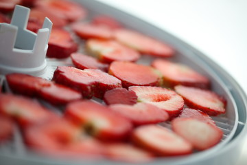 Strawberry berries cut dry plastic grid dryers