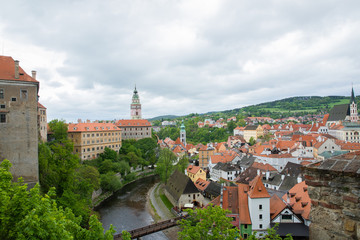 Fototapeta premium Landscape of the historic city of Cesky Krumlov with famous Cesky Krumlov Castle, Church city is on a UNESCO World Heritage Site