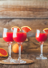 Three glasses of Mimosa cocktail