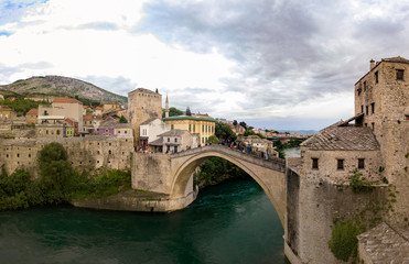 Fototapeta na wymiar Stari Most (literally 'Old Bridge'), also known as Mostar Bridge, is 16th-century Ottoman bridge in the city of Mostar in Bosnia and Herzegovina that crosses the river Neretva.