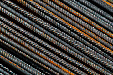 rusty iron grunge background: reinforcement bars, short focus