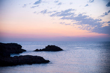  Maritime landscape at sunrise in the Mediterranean Sea with the lighthouse on