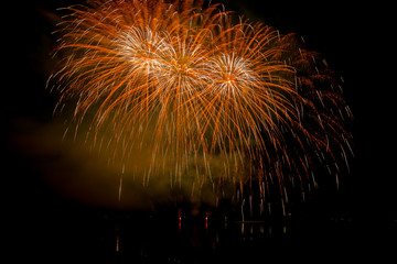 Fireworks fired over the water surface