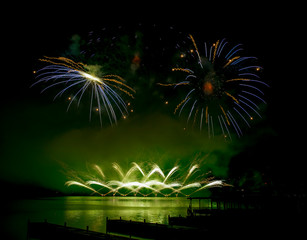 Fireworks fired over the water surface