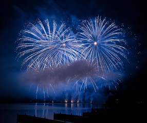 Fireworks fired over the water surface