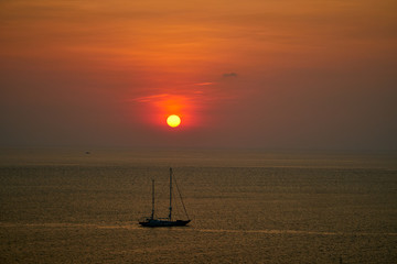 Sunset about sea with boat Thailand Phuket