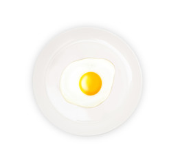 Top view of white dish with fried egg isolated on white