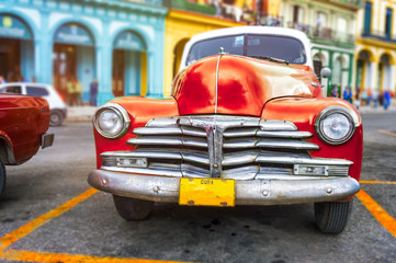 Colorful scene with classic car in Havana