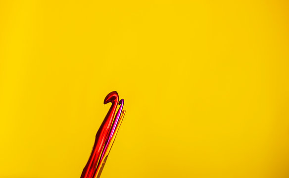 knitting needles and crochet hook