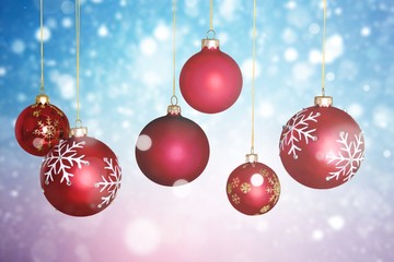Fototapeta na wymiar Red shiny decorative Christmas balls on white background