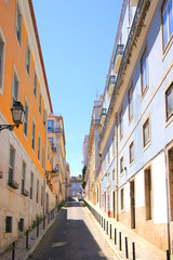 uphill alley in the bairro alto (old town) in lisbon, portugal