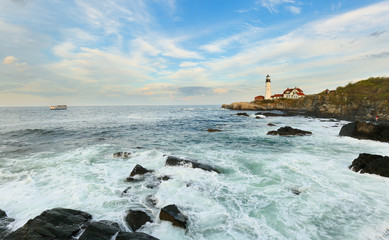 Beautiful sunset over the Portland Head Light Lighthouse at Fort Williams Park , Portland, Maine,...