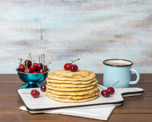 Sweet Homemade Stack of Pancakes with cherries