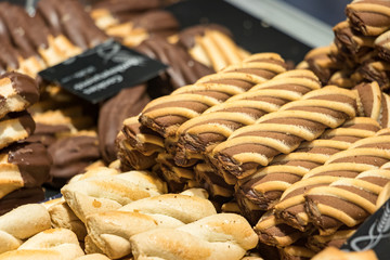 Twisted Greek cookies - voutimata and koulourakia, close up.