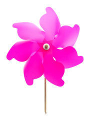 Isolated pink pinwheel toy on a white background.