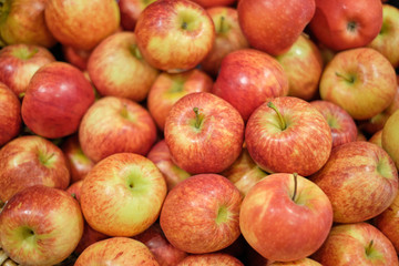 Fototapeta na wymiar Large group of ripe red apples as background.