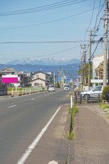 宮城県名取市・蔵王連峰の見える閖上港線の景色