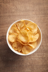 Potato chip fried  on wood background