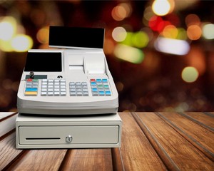 Cash register with LCD display on background