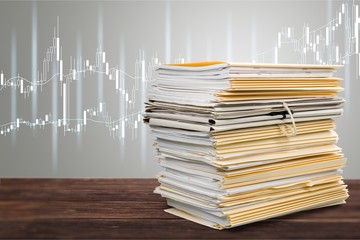 File folders with documents isolated on white background