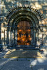 The Backgrounds of vintage door of Saint Mary’s Church and shading from the tree. Bergen, Norway - 272740440