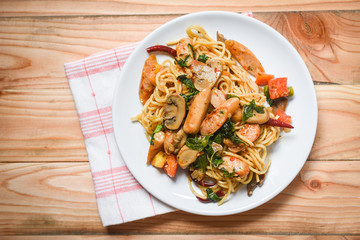 Hot and spicy Spaghetti Pasta tomato chilli and basil leaves top view / Traditional delicious Italian food