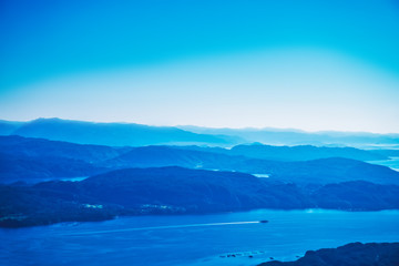 Fototapeta na wymiar Beautiful aerial view of blue mountain range on the way to Bergen Norway