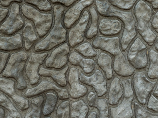 Fototapeta na wymiar texture concrete wall ornament stones